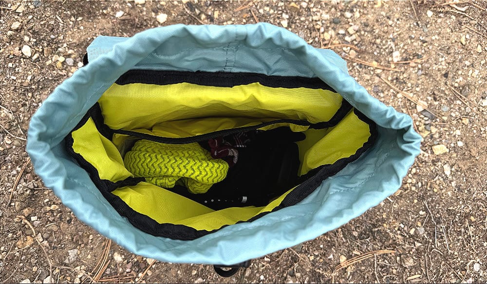 A view inside the topo designs rover mini backpack's main compartment