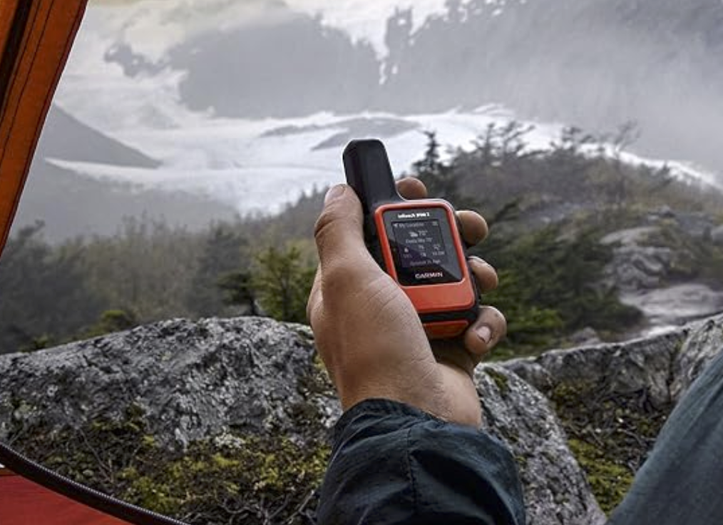 garmin inreach mini 2 being used on a backpacking trip