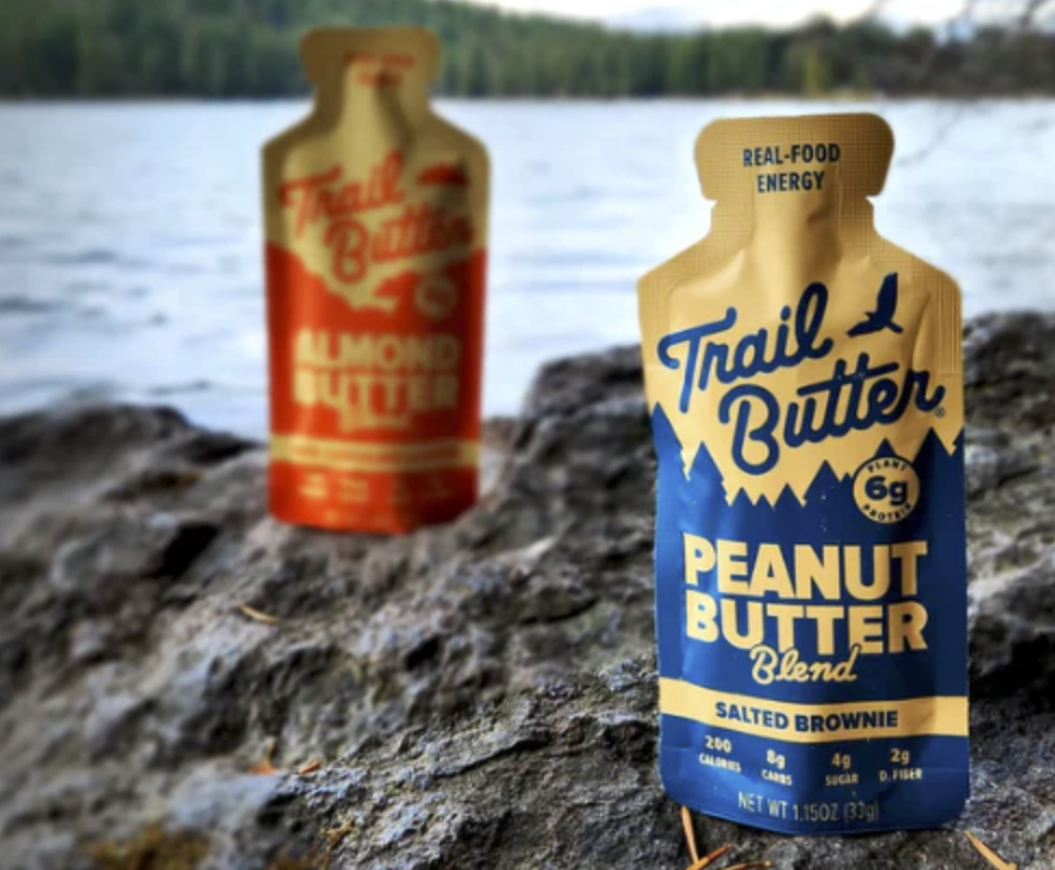 Salted Brownie Peanut Butter Blend by Trail Butter on the shore of a lake