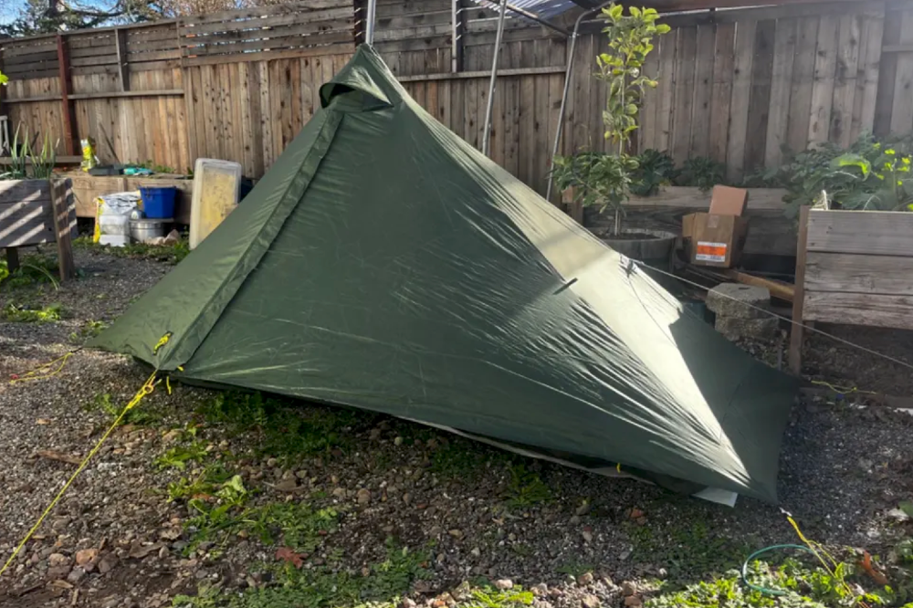 a top pick for an ultralight solo backpacking tent pitched in a yard as a means to practice setting it up