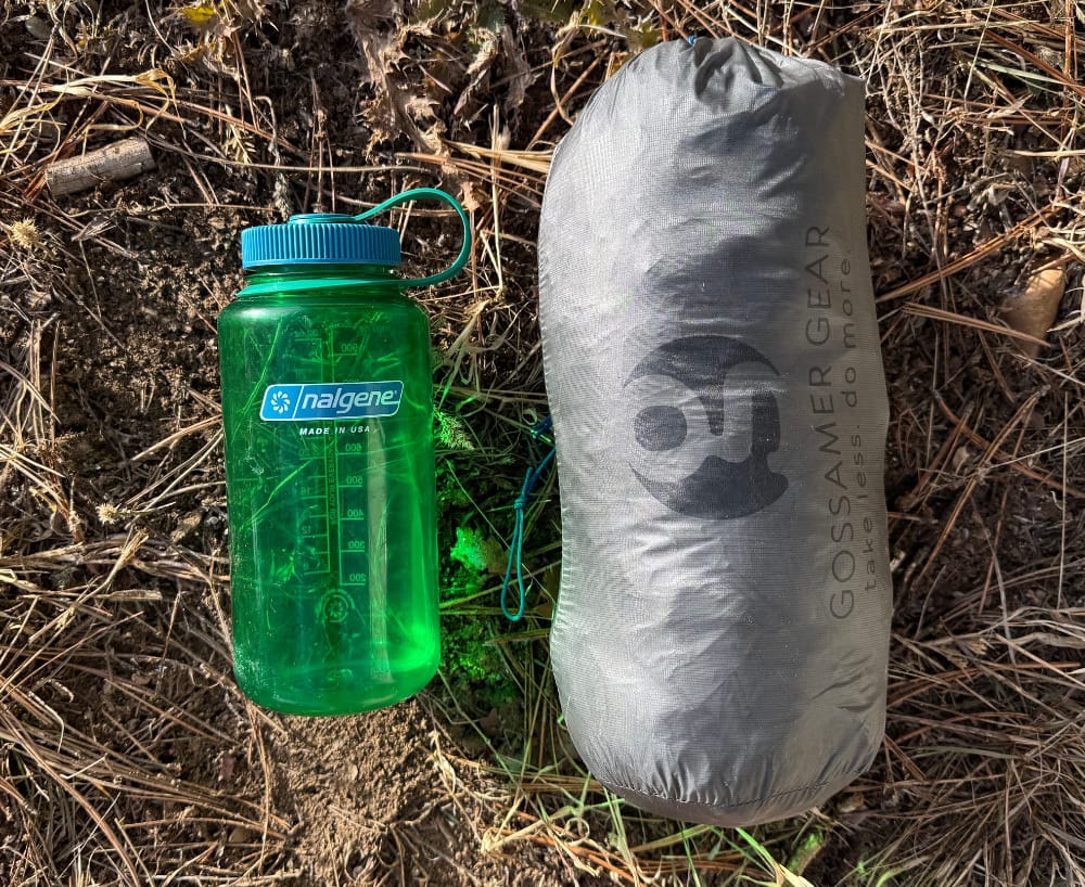 an ultralight backpacking tent size comparison with a nalgene bottle