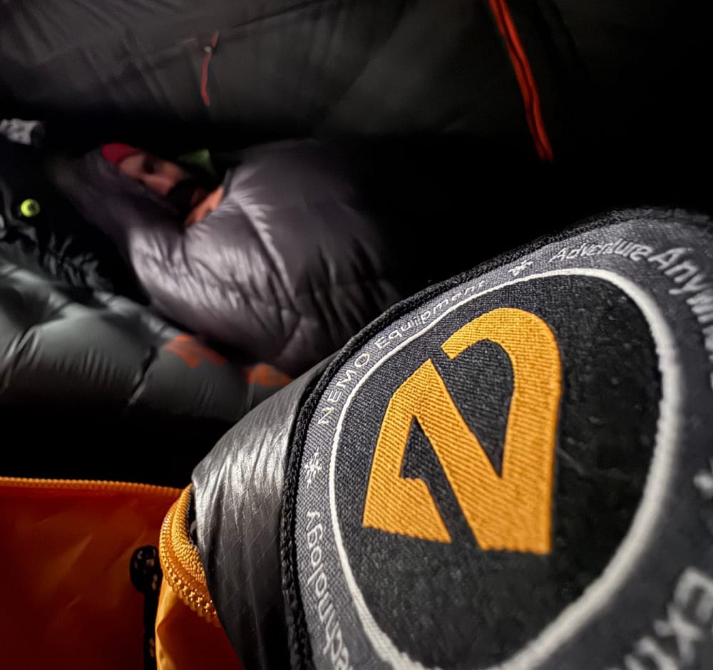 a view from someone inside the nemo equipment sonic -20° down ultralight mummy sleeping bag on a winter backpacking trip