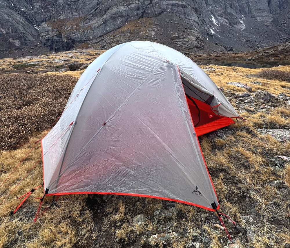 slingfin portal 3 tent pitched in the alpine during a backpacking trip