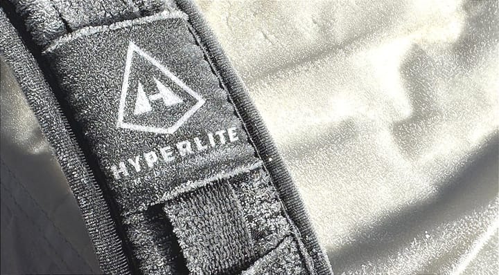 a hyperlite mountain gear backpack made from dyneema is coated in frost during a very cold backpacking trip