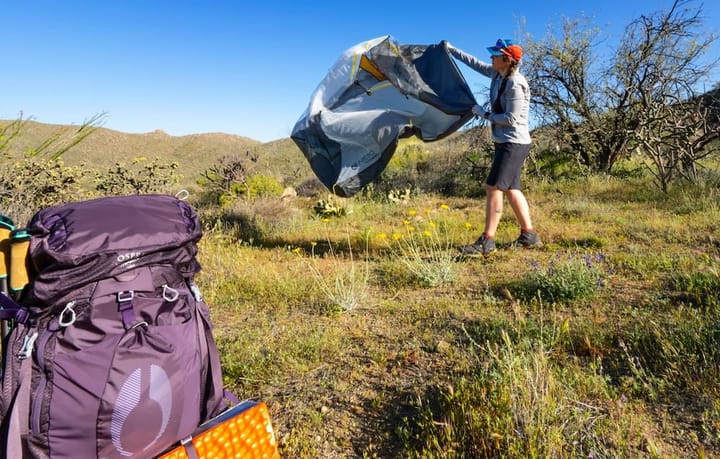 setting up a tent while backpacking the sky island traverse