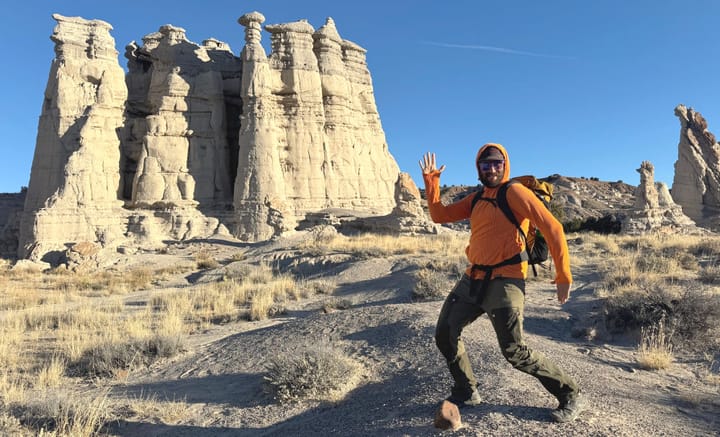 the squak grid fleece hoodie on a hiker in the Southwest